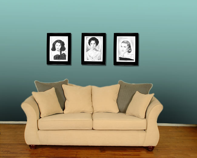 Framed prints above a sofa